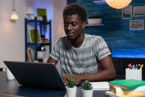 African american entrepreneur man browsing marketing information